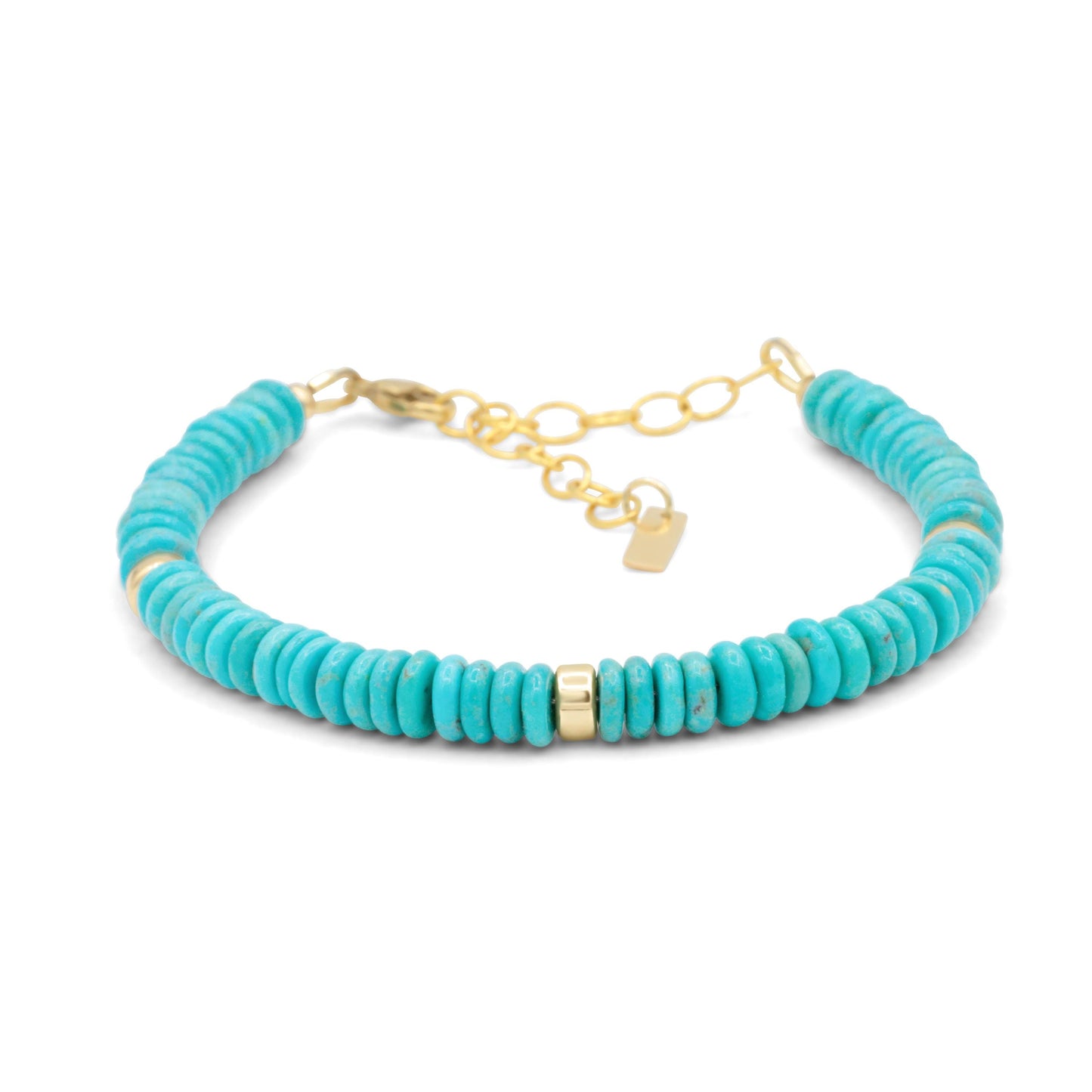 Earthly Abundance Kingman turquoise accents in 14K gold-filled jewelry, showcasing vibrant turquoise stones and gold detailing.