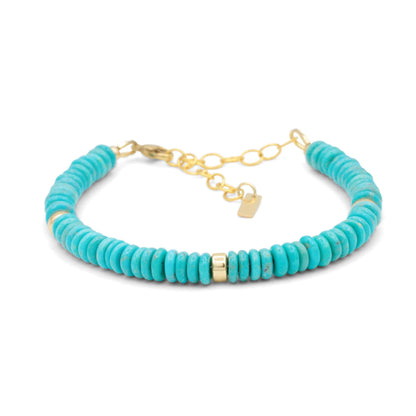 Earthly Abundance Kingman turquoise accents in 14K gold-filled jewelry, showcasing vibrant turquoise stones and gold detailing.