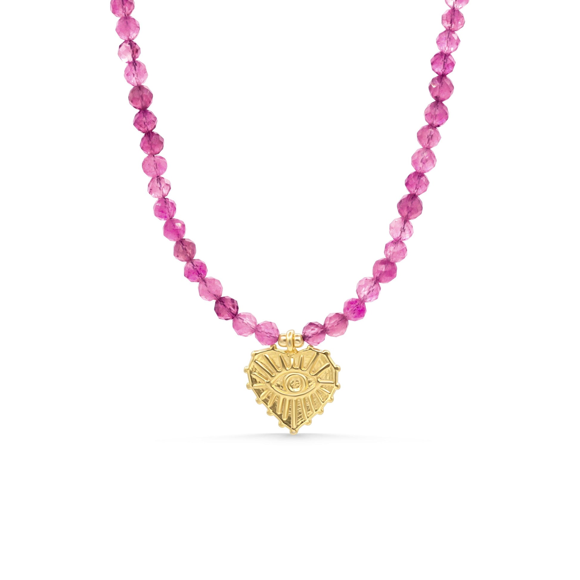 Pink Tourmaline Evil Eye Heart pendant from Earthly Abundance, featuring a heart-shaped pink gemstone with evil eye design.