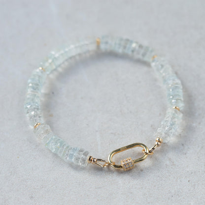 White topaz carabiner bracelet by Earthly Abundance featuring sparkling gemstones and a secure metal clasp.