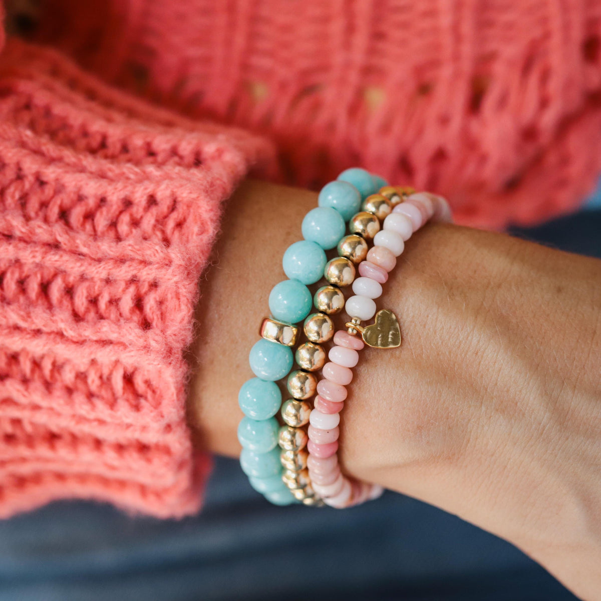Pink Opal heart bracelet from Earthly Abundance featuring pink gemstone hearts on a delicate bracelet chain.