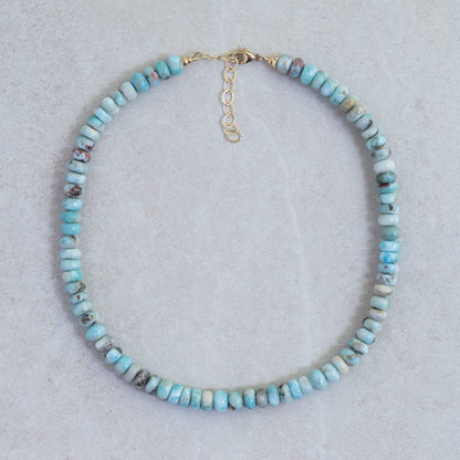 Candy Larimar necklace by Earthly Abundance featuring a smooth, oval Larimar pendant on a delicate silver chain.