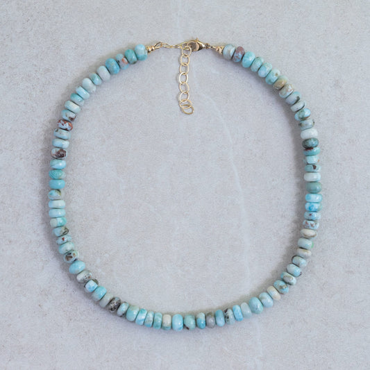 Candy Larimar necklace by Earthly Abundance featuring a smooth, oval Larimar pendant on a delicate silver chain.
