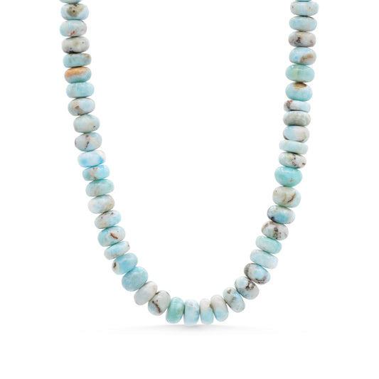 Elegant Candy Larimar necklace by Earthly Abundance featuring a polished blue larimar pendant on a silver chain.