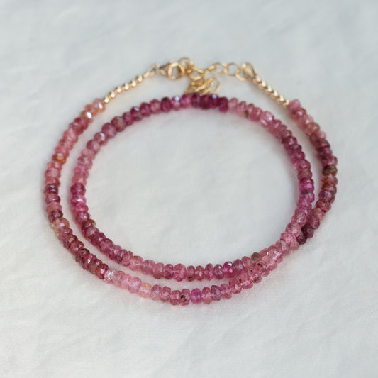 Pink tourmaline necklace featuring a delicate pendant with pink tourmaline gemstones on a fine chain, by Earthly Abundance.
