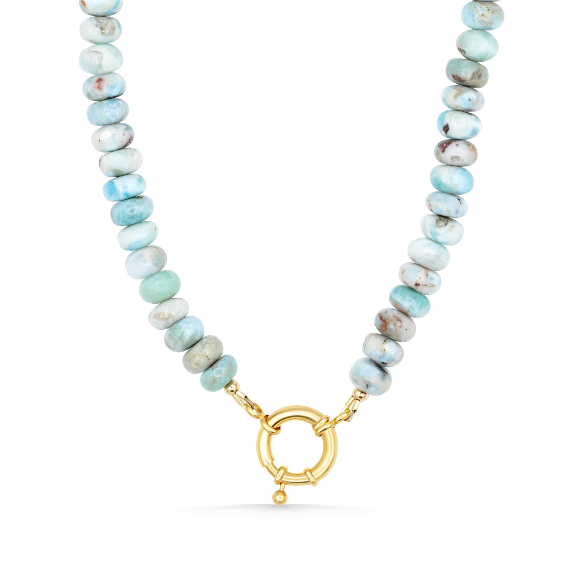 Larimar toggle necklace by Earthly Abundance featuring a blue gemstone pendant on a silver chain.