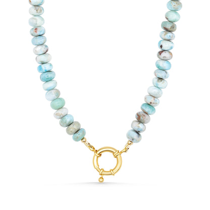 Larimar toggle necklace by Earthly Abundance featuring a blue gemstone pendant on a silver chain.