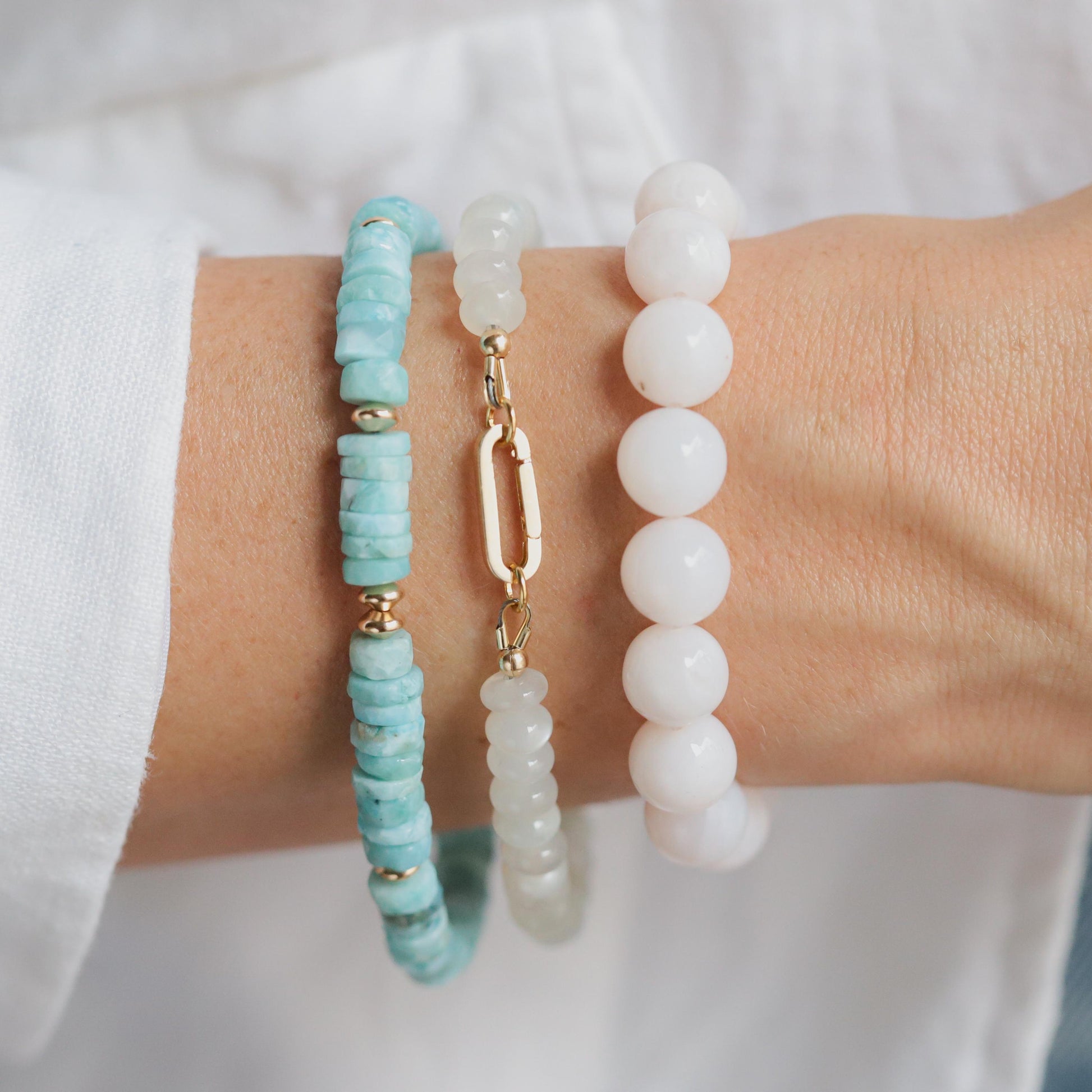 Larimar Heishi bracelet with 14K gold-filled accents, featuring smooth blue gemstone beads, from Earthly Abundance.