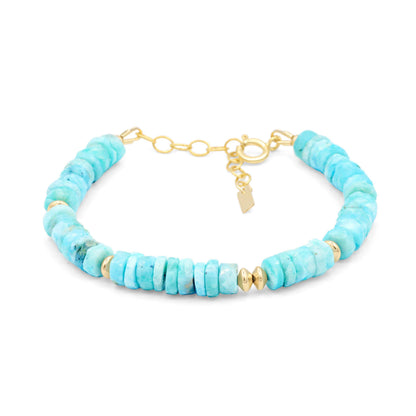 Larimar Heishi bracelet with 14K gold-filled accents, natural blue gemstone beads, and handcrafted design from Earthly Abundance.