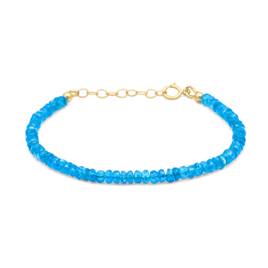 Aapatite bracelet made with genuine blue apatite gemstones on a 14K gold chain, showcasing elegant jewelry design.