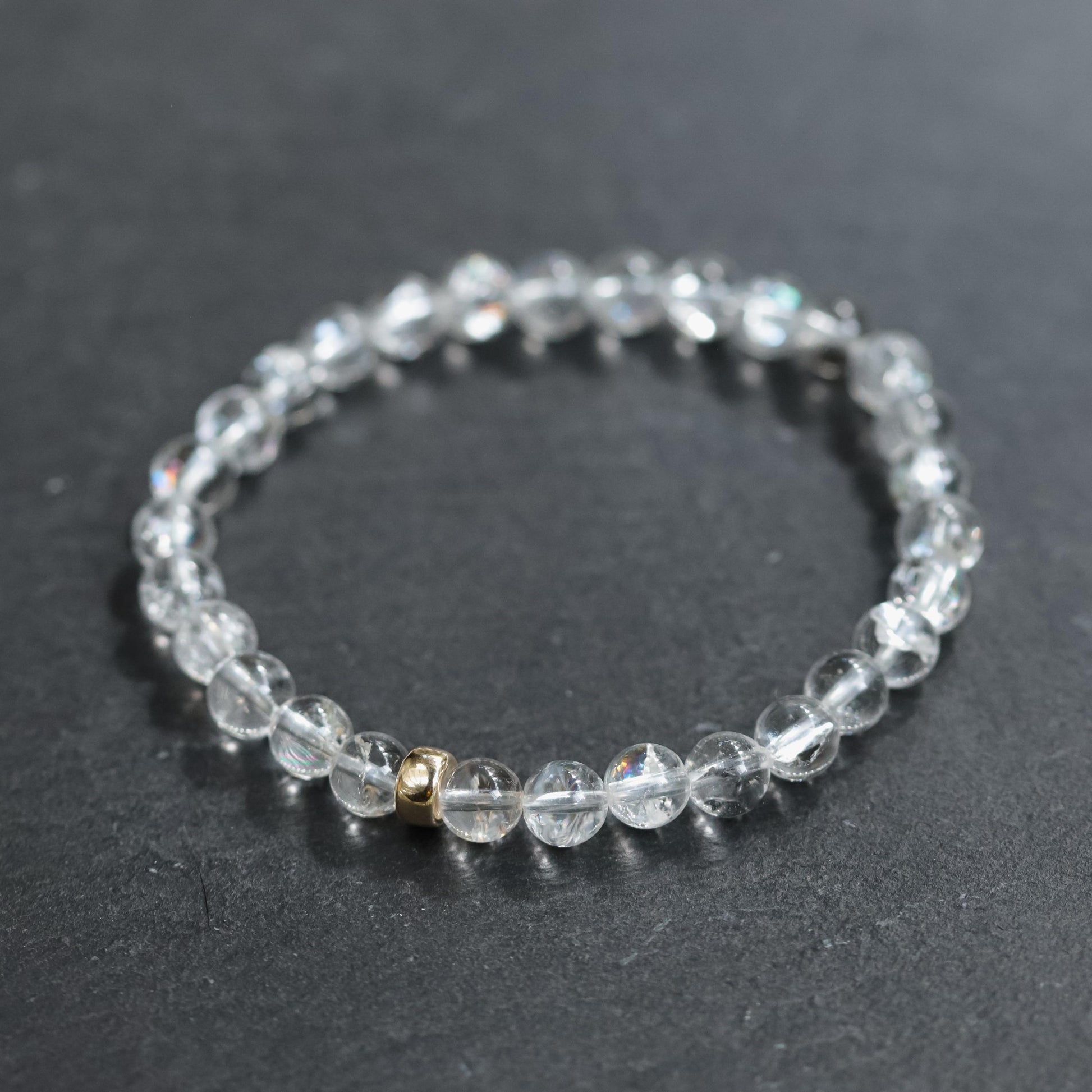 Clear Quartz crystal from Earthly Abundance, showcasing its transparent, energizing structure and natural hexagonal shape.