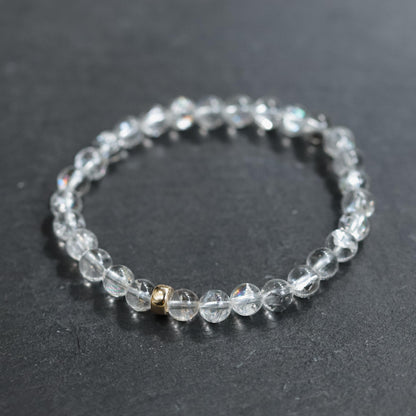 Clear Quartz crystal from Earthly Abundance, showcasing its transparent, energizing structure and natural hexagonal shape.