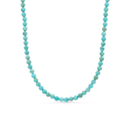 Earthly Abundance Kingman turquoise necklace with 14K gold chain, showcasing vibrant blue turquoise stones and elegant jewelry design.