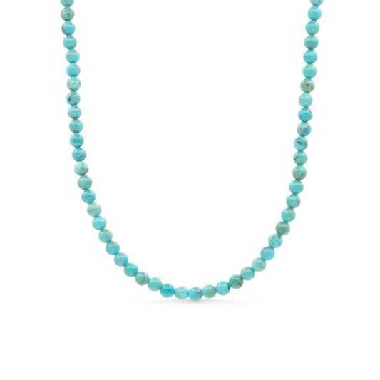 Earthly Abundance Kingman turquoise necklace with 14K gold chain, showcasing vibrant blue turquoise stones and elegant jewelry design.