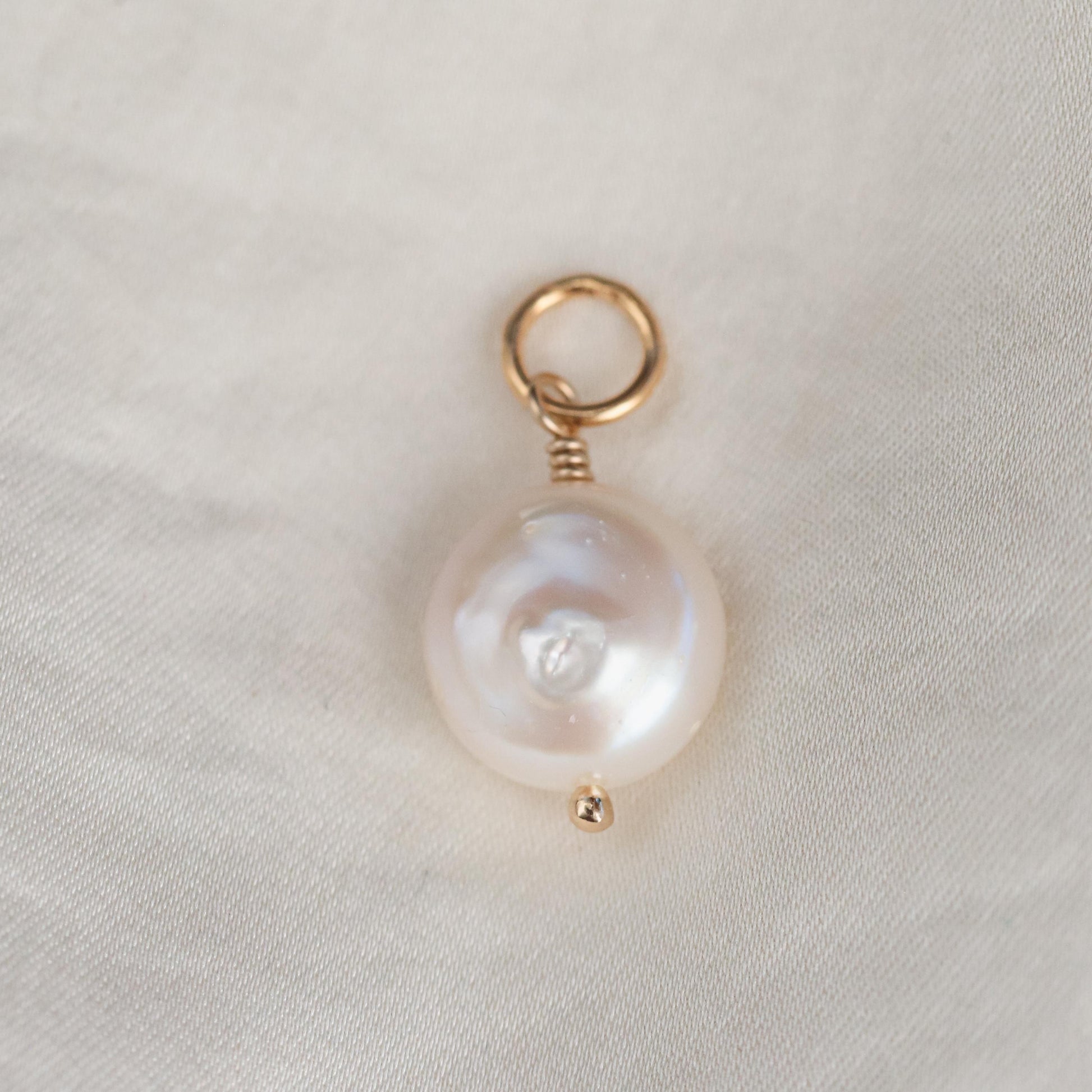 Freshwater pearl pendant on 14K gold chain, elegant jewelry piece by Earthly Abundance with a lustrous pearl centerpiece.