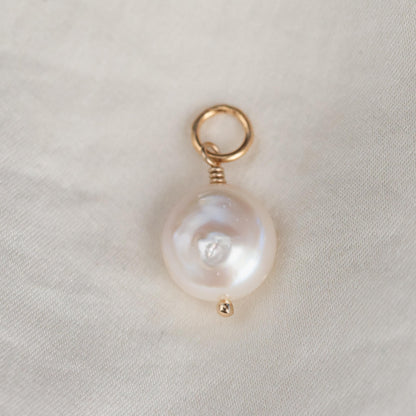 Freshwater pearl pendant on 14K gold chain, elegant jewelry piece by Earthly Abundance with a lustrous pearl centerpiece.