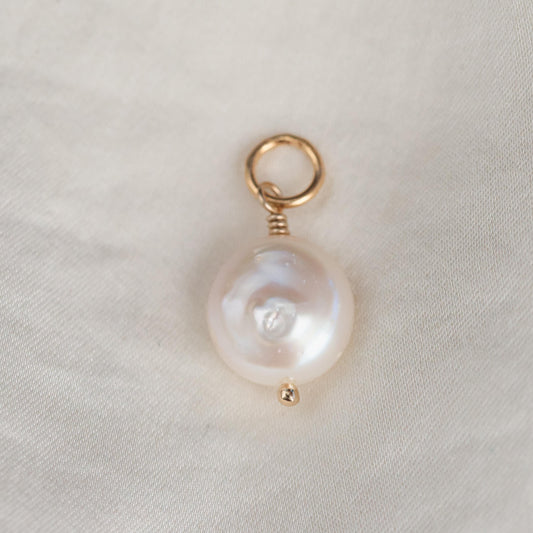 Freshwater pearl pendant on 14K gold chain, elegant jewelry piece by Earthly Abundance with a lustrous pearl centerpiece.