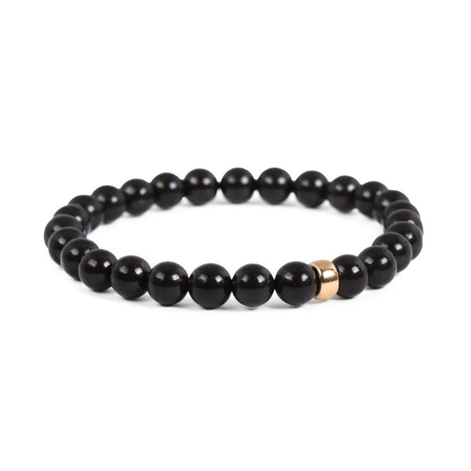 Shungite beads in 4mm, 6mm, or 8mm size, natural stones with 14K gold accents, from Earthly Abundance.