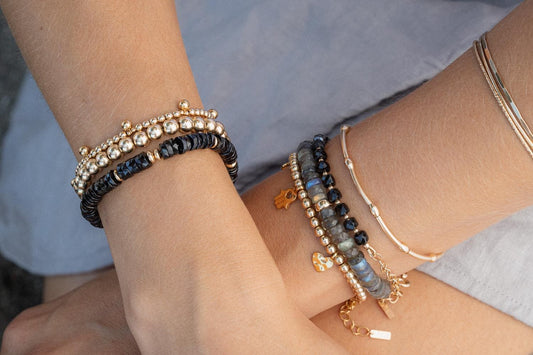 Black Tourmaline Heishi bracelet featuring small round black stones from Earthly Abundance, styled with a stretch fit.