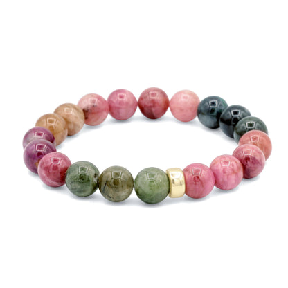 Mixed tourmaline strength bracelet with 14K gold setting, featuring colorful gemstones, by Earthly Abundance.