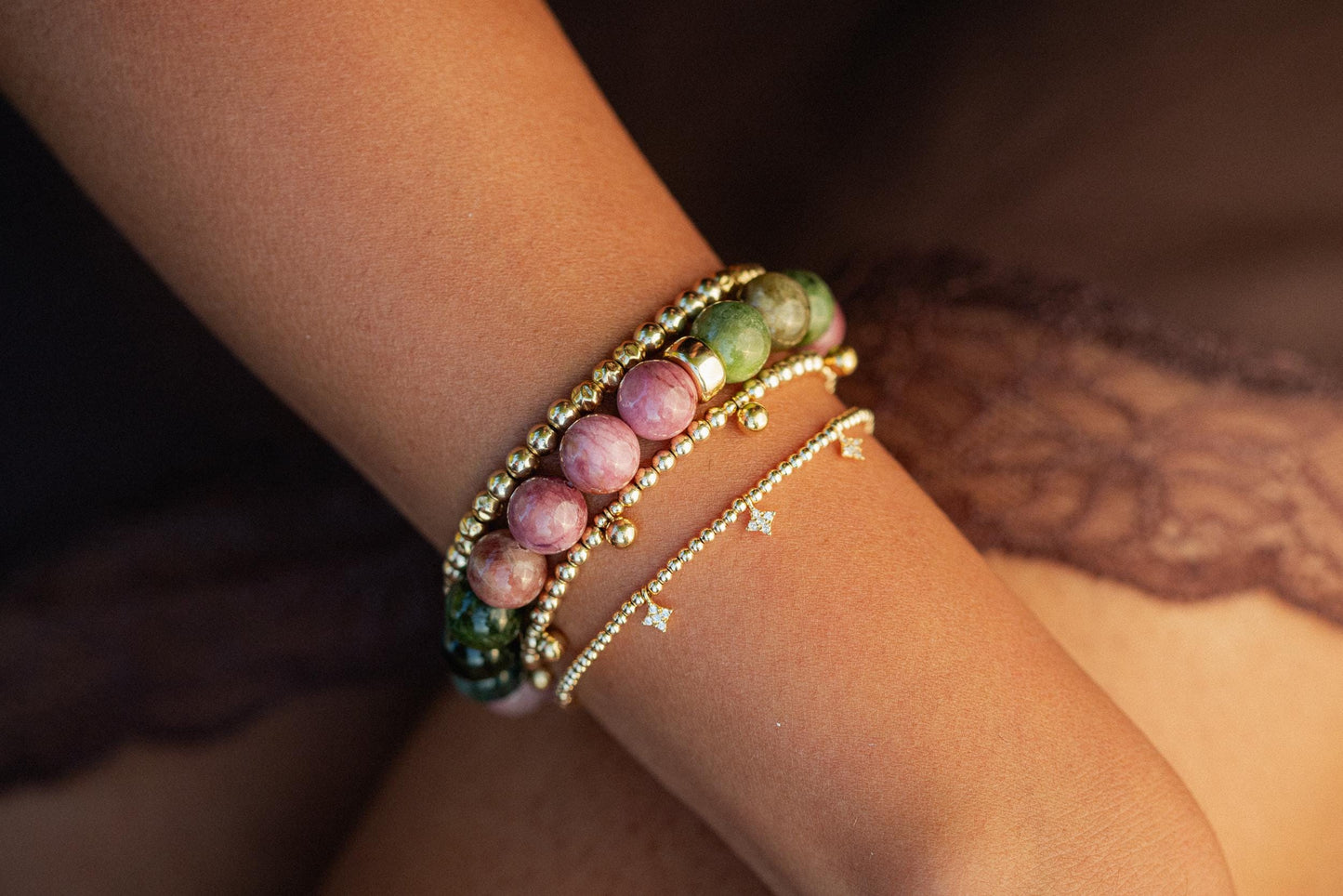 Mixed tourmaline strength bracelet with 14K gold setting, featuring colorful gemstone beads on a delicate chain.