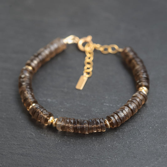 Smoky Quartz bracelet from Earthly Abundance featuring polished, natural gemstone beads on an elastic band.