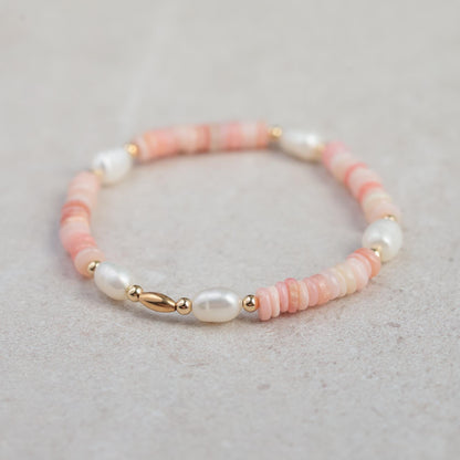 Pink Opal Pearl Bracelet featuring smooth pink opal beads and silver clasp from Earthly Abundance.