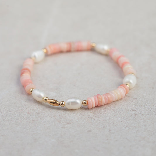 Pink Opal Pearl Bracelet featuring smooth pink opal beads and silver clasp from Earthly Abundance.