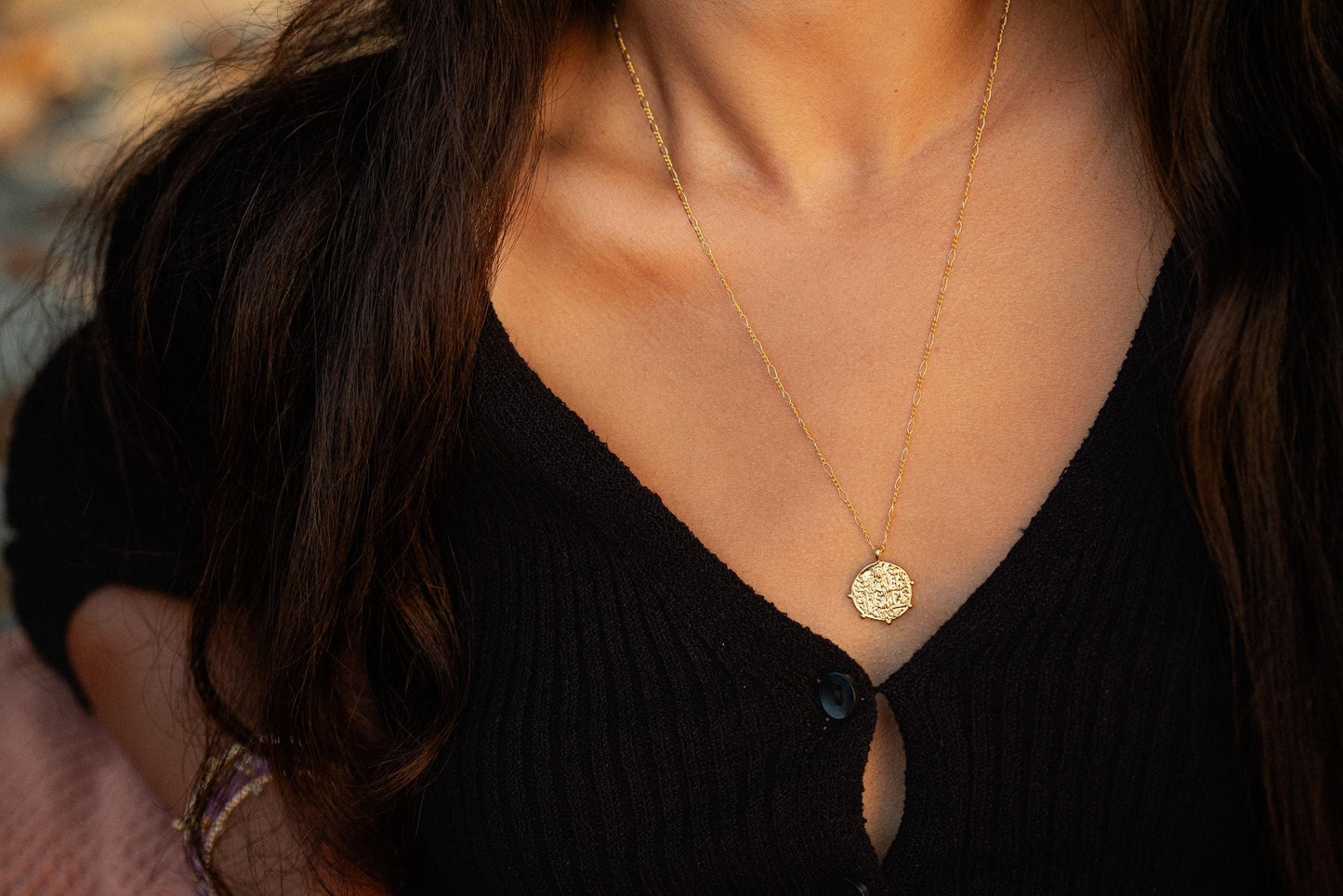 Greek style pendant necklace by Earthly Abundance featuring a detailed pendant on a delicate chain.