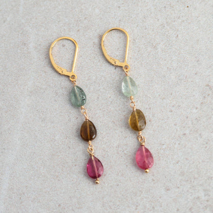 Delicate mixed tourmaline drop earrings by Earthly Abundance featuring colorful gemstone dangles and sterling silver hooks.