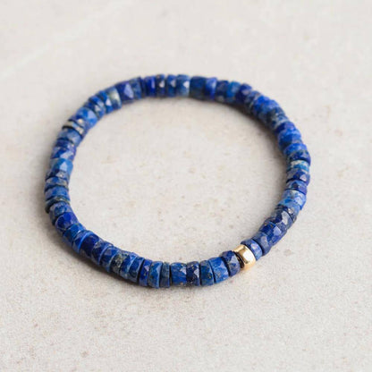 Wholesale Lapis Lazuli Heishi beads from Earthly Abundance Jewelry, showcasing vibrant blue gemstone strands.