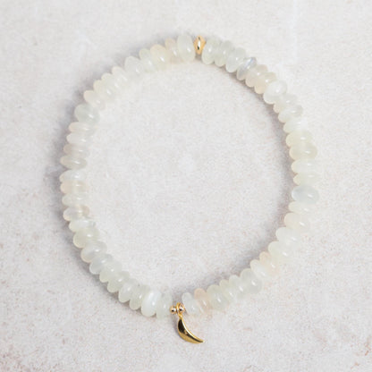 Beautiful moonstone bracelet from Earthly Abundance featuring polished moonstone beads on a stretchy band.