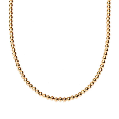 14k gold filled necklace from Earthly Abundance Jewelry, close-up view showcasing delicate chain and elegant design.
