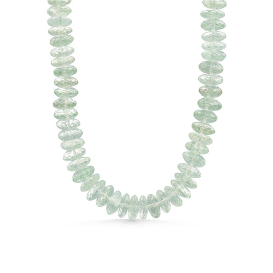 Green amethyst necklace with 14k gold setting, featuring a polished green gemstone on a delicate gold chain.