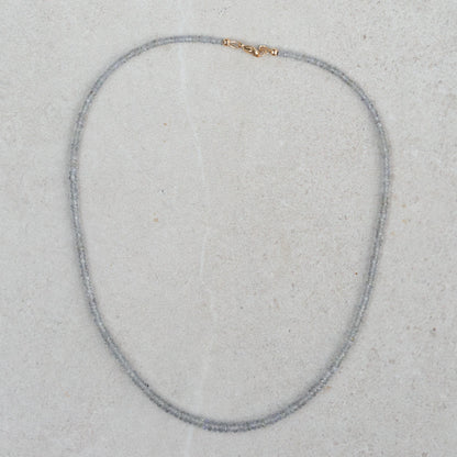 Grey sapphire necklace in 14K gold from Earthly Abundance featuring a delicate chain with a central grey sapphire pendant.