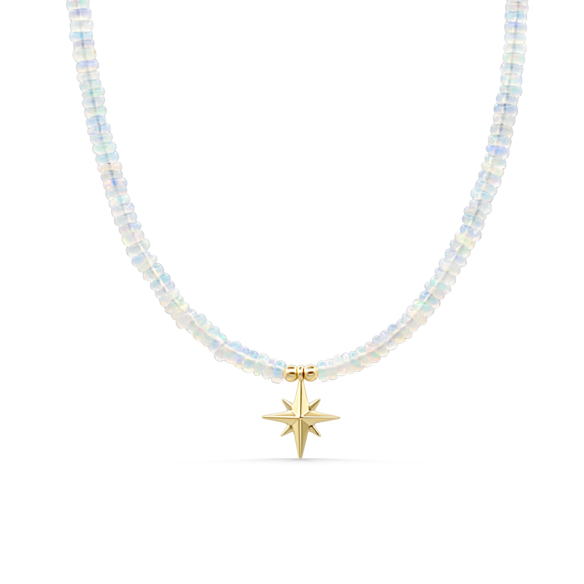 Ethiopian Opal North Star Necklace with 14K gold chain from Earthly Abundance, featuring a shimmering star-shaped opal pendant.