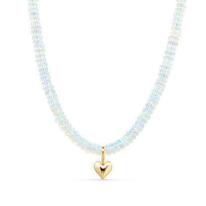 Ethiopian Opal Heart Necklace with 14K gold chain from Earthly Abundance, showcasing a luminous heart-shaped opal pendant.