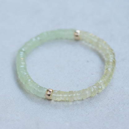 Prehnite and lemon quartz beaded bracelet from Earthly Abundance with polished stones and elastic band for a stylish, natural look.