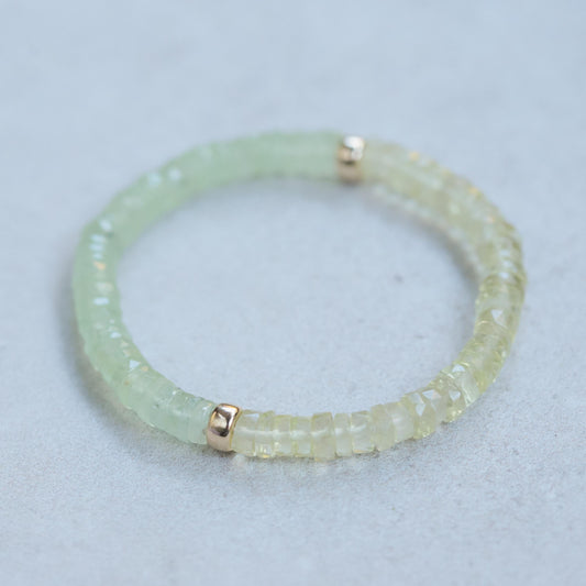 Prehnite and lemon quartz beaded bracelet from Earthly Abundance with polished stones and elastic band for a stylish, natural look.