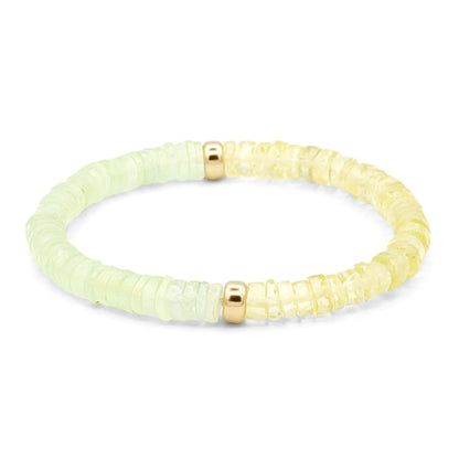 Prehnite and lemon quartz bracelet featuring polished gemstone beads, designed by Earthly Abundance.
