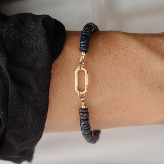 Black Opal Carabiner Bracelet by Earthly Abundance featuring black opal stones and a sturdy metal carabiner clasp.