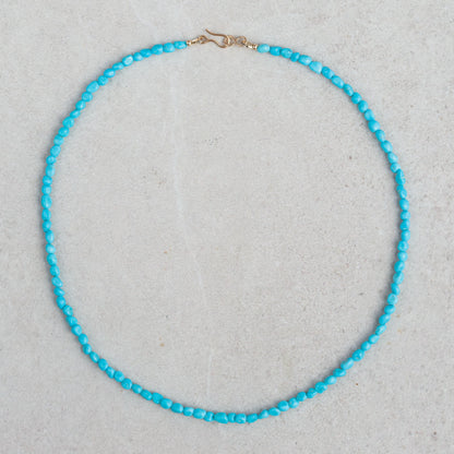 Sleeping Beauty Nugget Necklace by Earthly Abundance featuring raw turquoise nugget pendant on a silver chain.
