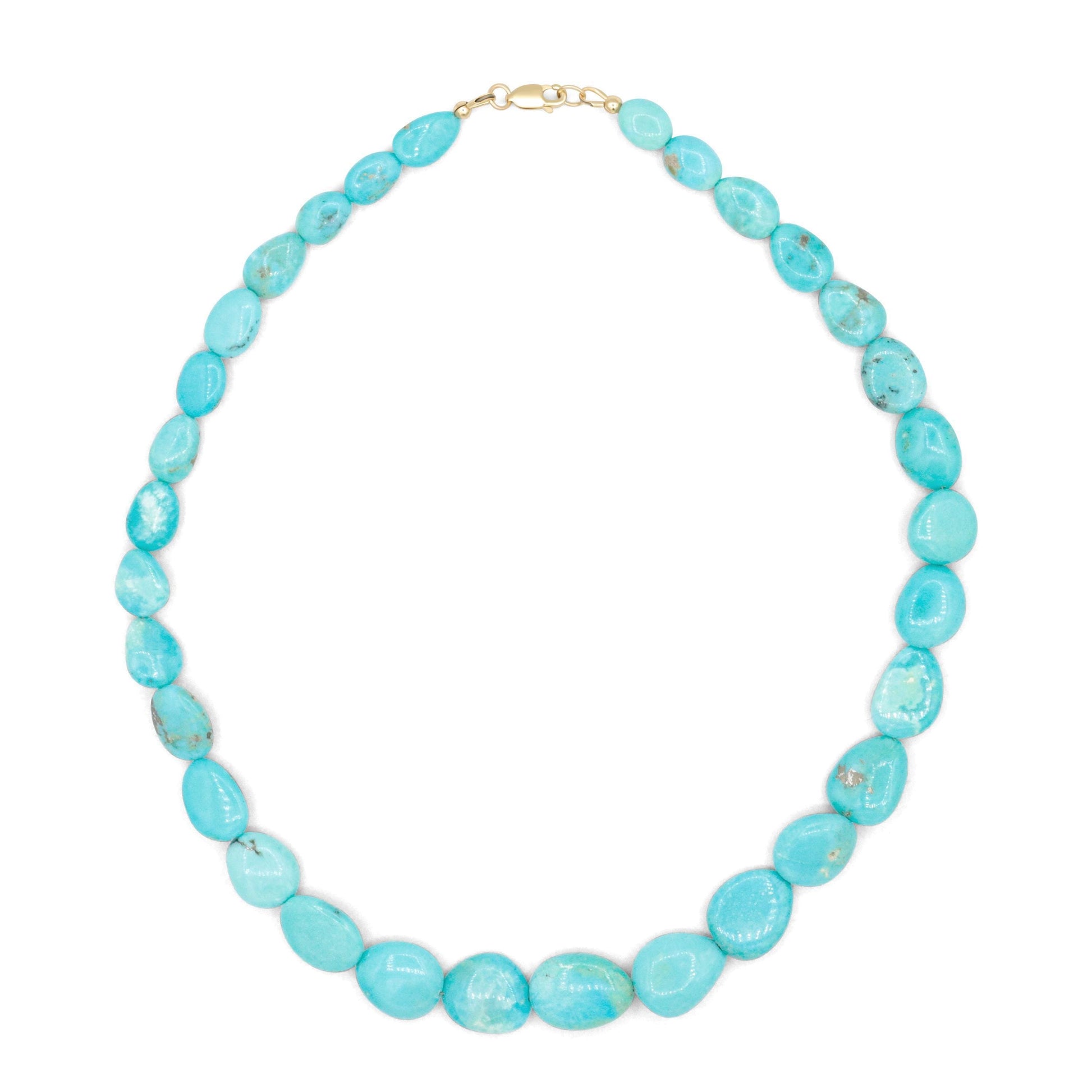 Turquoise sol necklace in 14K gold with a delicate chain, featuring a vibrant turquoise pendant, by Earthly Abundance.