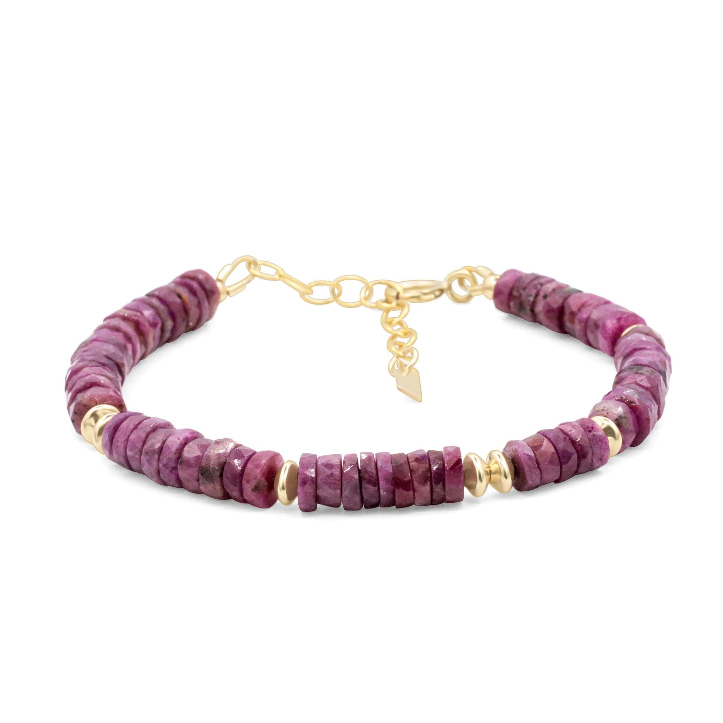 Earthly Abundance Ruby Rhythm Bracelet featuring vibrant red ruby beads and a delicate silver clasp on a neutral background.