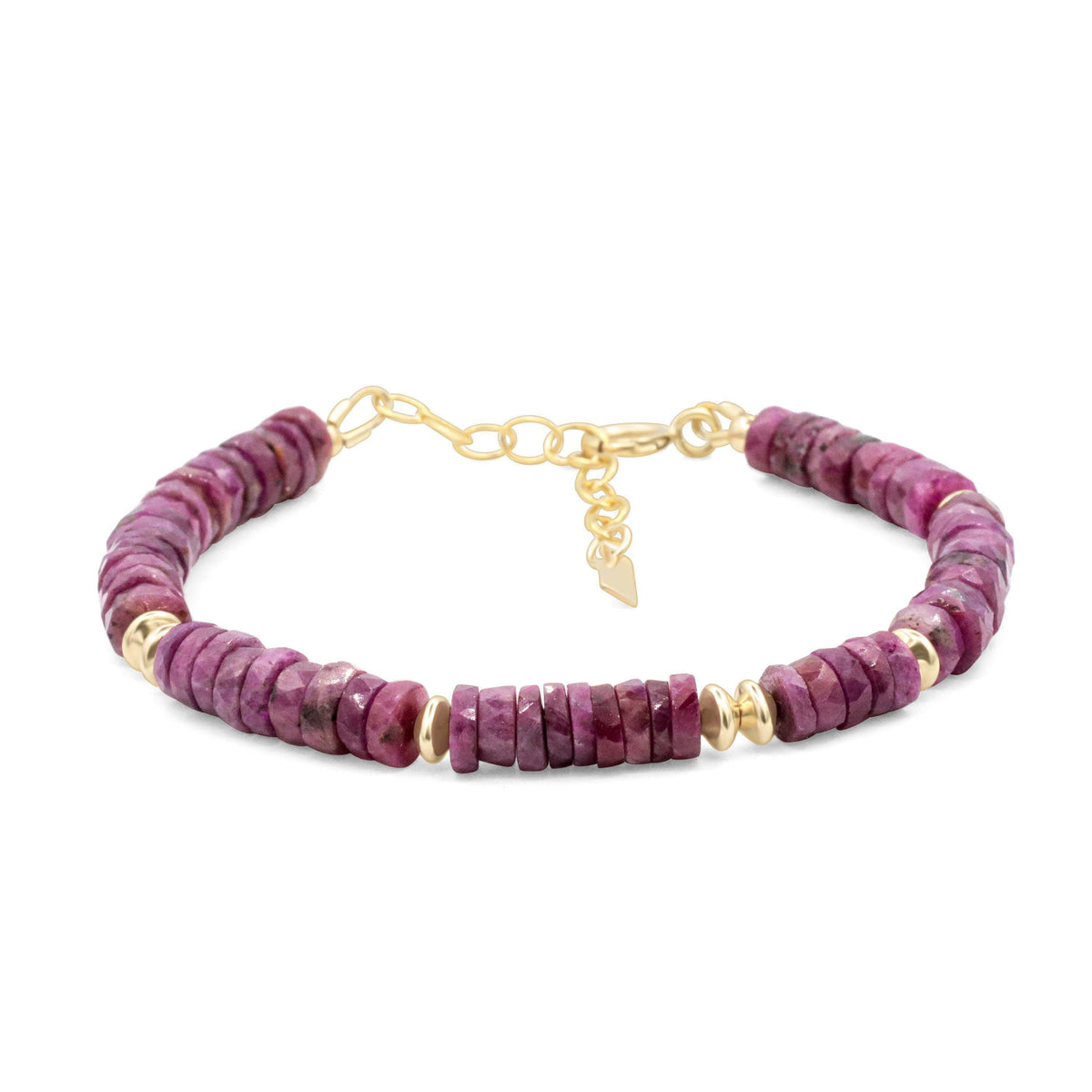Earthly Abundance Ruby Rhythm Bracelet featuring vibrant red ruby beads and a delicate silver clasp on a neutral background.