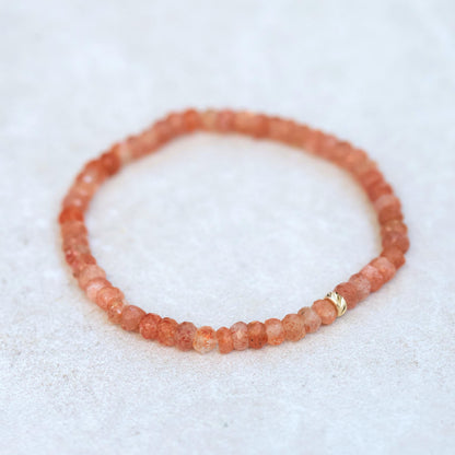 Sunstone bracelet made with 14K gold, featuring polished sunstone beads, by Earthly Abundance.