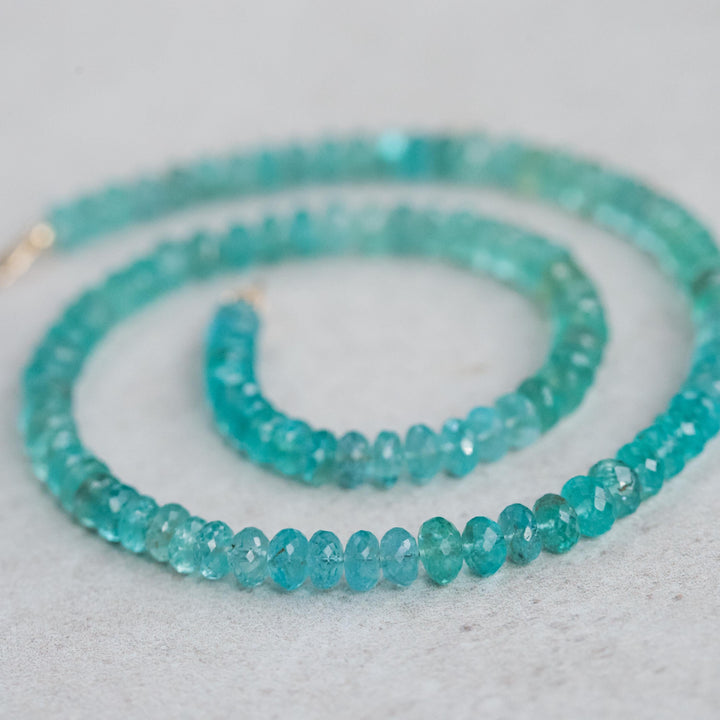 Bi-color apatite necklace in 14K gold chain, featuring vibrant blue and green stones, from Earthly Abundance.