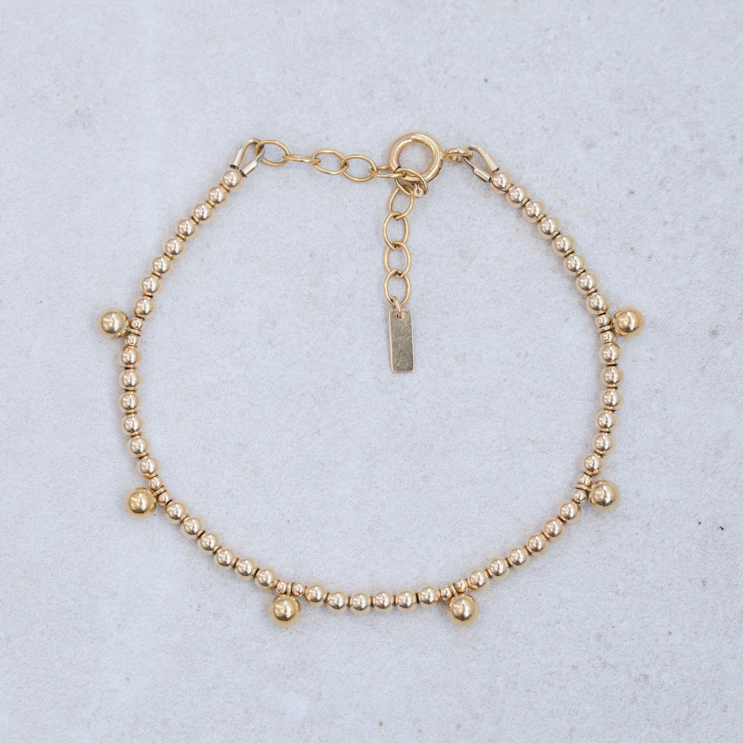 Gold filled beaded ball bracelet from Earthly Abundance featuring a stylish, handcrafted jewelry design with small round beads.