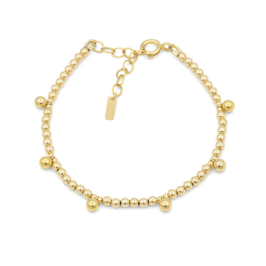 Gold filled beaded ball bracelet by Earthly Abundance featuring a row of shiny gold beads on a delicate chain.