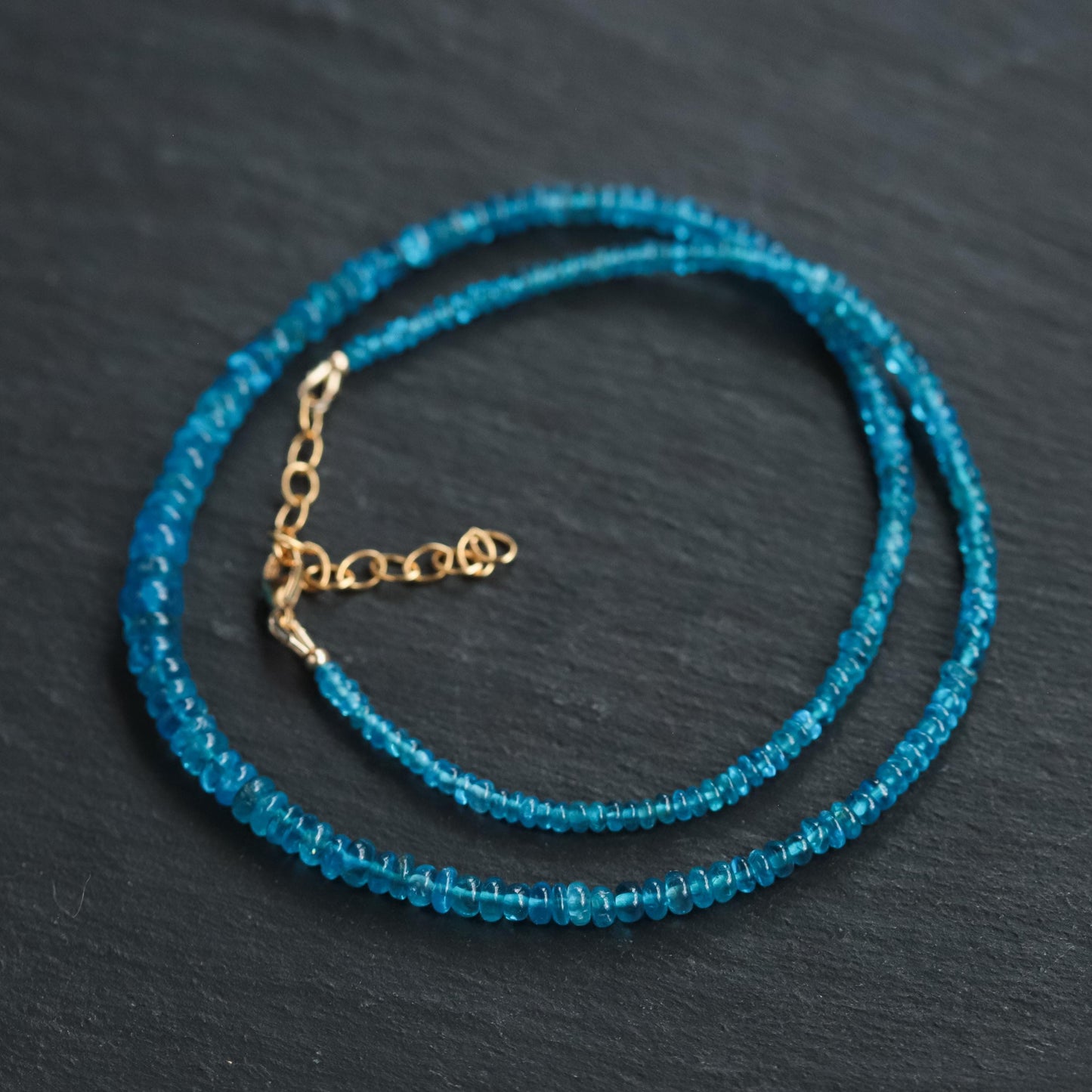 Earthly Abundance Gemmy Apatite necklace featuring a vibrant blue apatite pendant on a delicate chain.